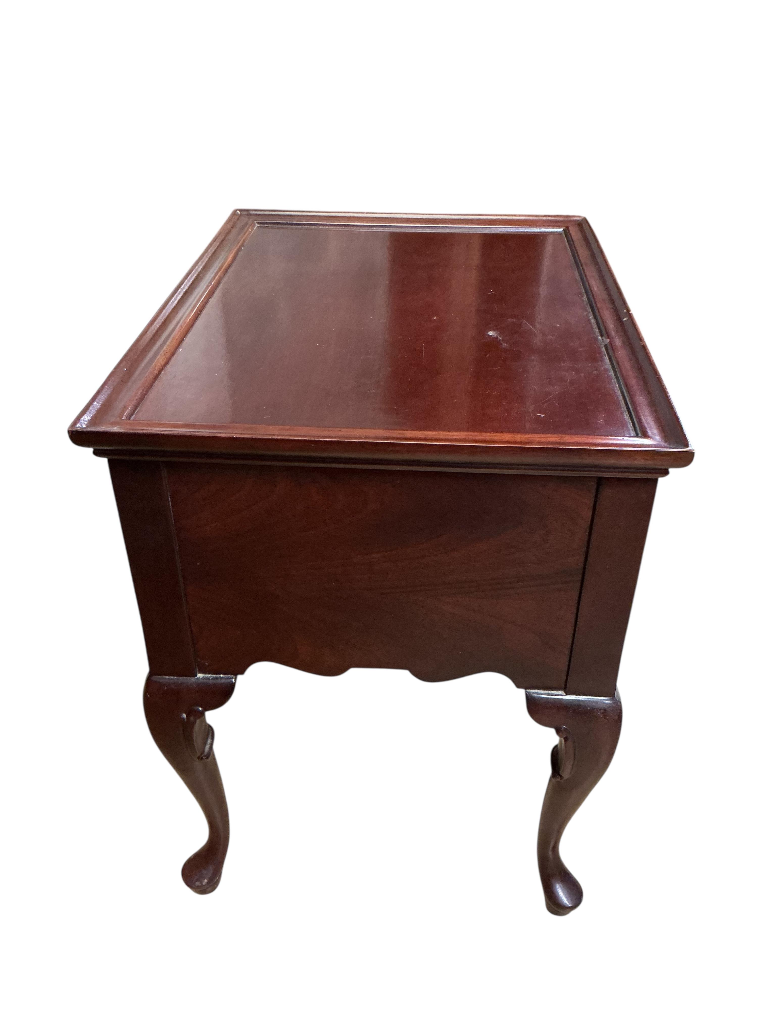 A George III mahogany lowboy, fitted with a single drawer, width 61cm, depth 46cm, height 61cm